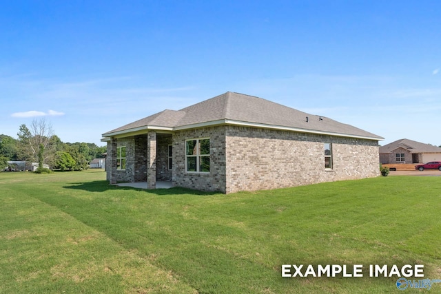 view of home's exterior featuring a yard and a patio area