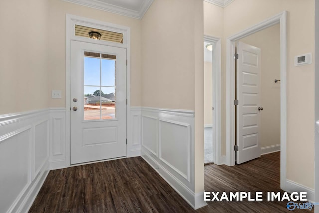 entryway featuring ornamental molding and dark hardwood / wood-style floors