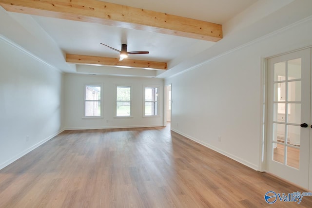 unfurnished room with beam ceiling, baseboards, a ceiling fan, and light wood-style flooring