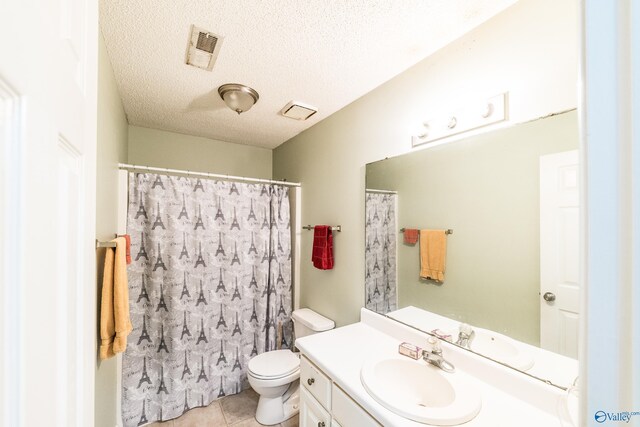106 Spinnaker Ridge Dr, Huntsville, AL 35824 - full bathroom with vanity, toilet, a textured ceiling, tile patterned floors, and visible vents