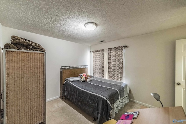 106 Spinnaker Ridge Dr, Huntsville, AL 35824 - bedroom featuring carpet flooring, a textured ceiling, baseboards, and visible vents