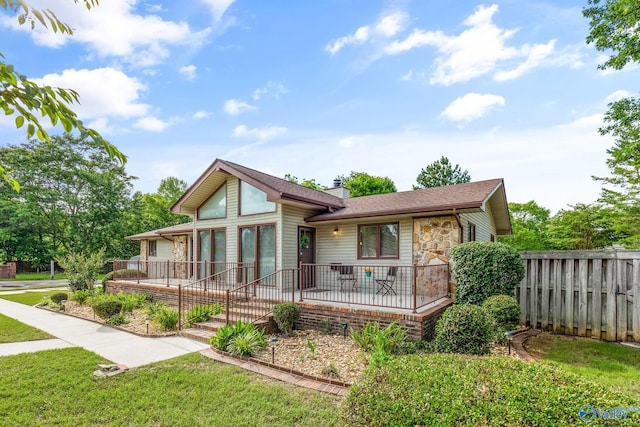 2009 Rangewood Cir, Huntsville, AL 35803 - view of front facade with a chimney, covered porch, and a shingled roof
