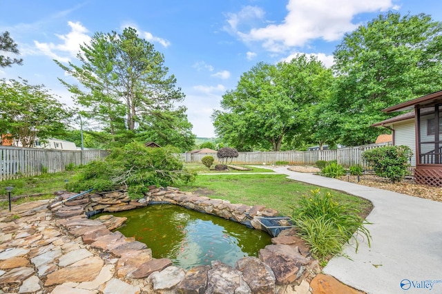 2009 Rangewood Cir, Huntsville, AL 35803 - view of yard featuring a small pond