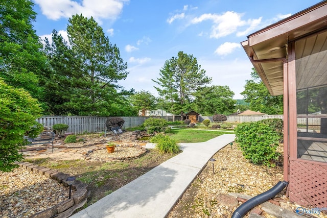 2009 Rangewood Cir, Huntsville, AL 35803 - fenced backyard featuring an outbuilding