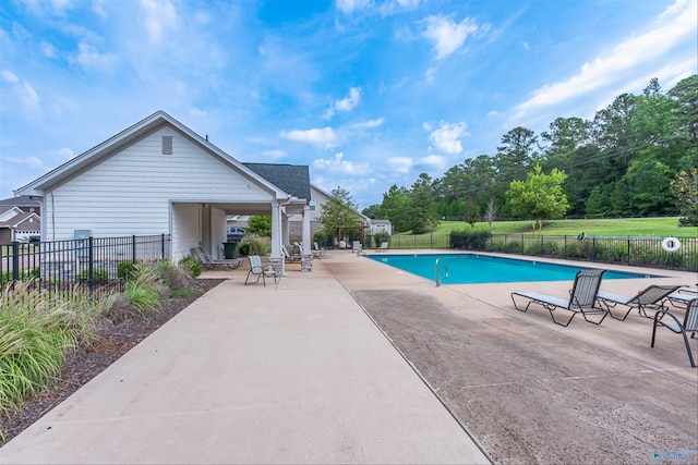 view of pool with a patio area