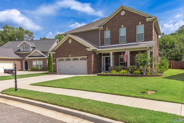 view of front of house with a garage, a front yard, and a porch