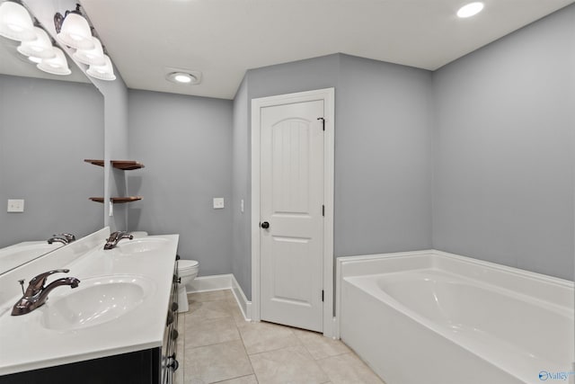 18226 Whitetail Ln, Athens, AL 35613 - bathroom featuring a bath, tile patterned flooring, recessed lighting, double vanity, and toilet