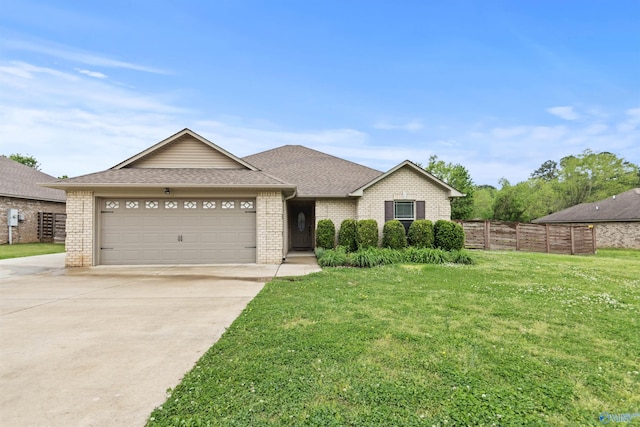 18226 Whitetail Ln, Athens, AL 35613 - ranch-style house featuring brick siding, concrete driveway, an attached garage, and a shingled roof