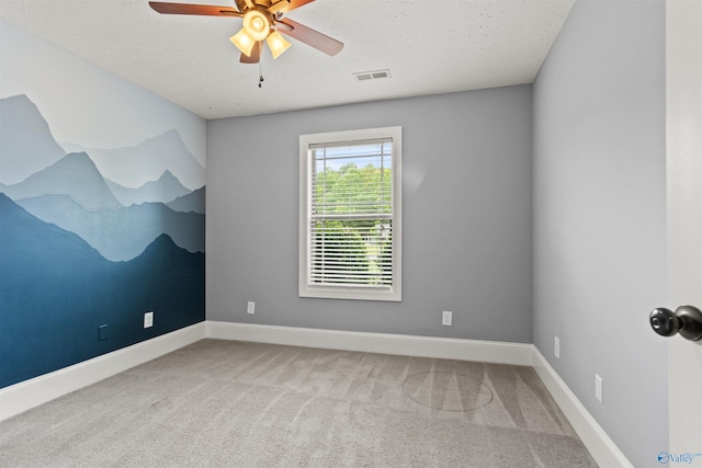 18226 Whitetail Ln, Athens, AL 35613 - carpeted spare room with ceiling fan, baseboards, and a textured ceiling