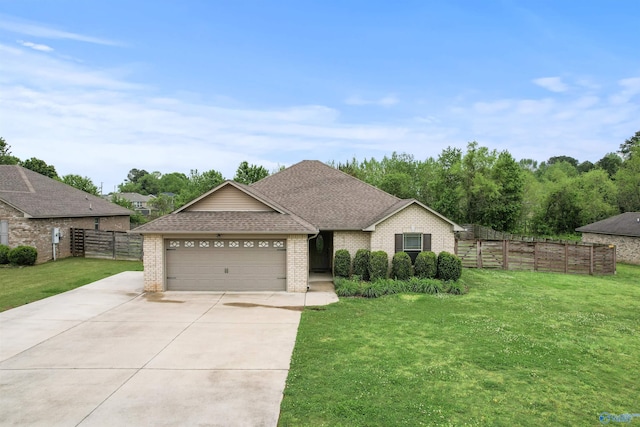 18226 Whitetail Ln, Athens, AL 35613 - view of front of home with brick siding, a garage, driveway, and roof with shingles