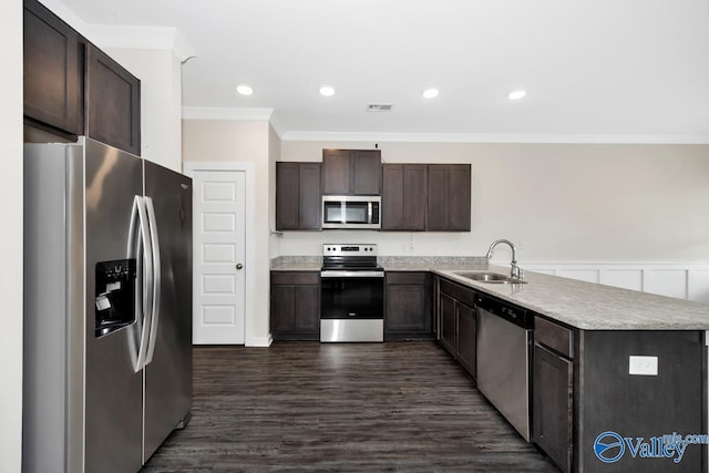 6032 Barringer Ct, Huntsville, AL 35806 - kitchen with visible vents, a sink, ornamental molding, appliances with stainless steel finishes, and dark brown cabinetry