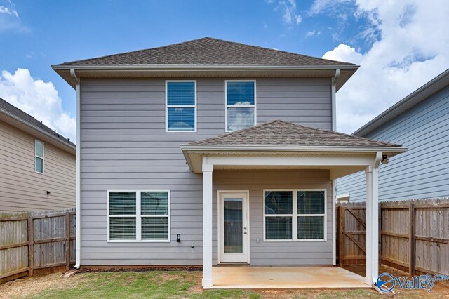 6032 Barringer Ct, Huntsville, AL 35806 - back of house with roof with shingles, a patio area, and a fenced backyard