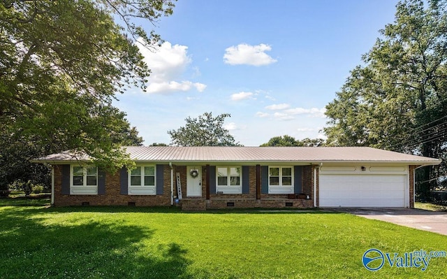 3392 Williams St, Hokes Bluff, AL 35903 - ranch-style home featuring crawl space, a garage, a front yard, concrete driveway, and a metal roof