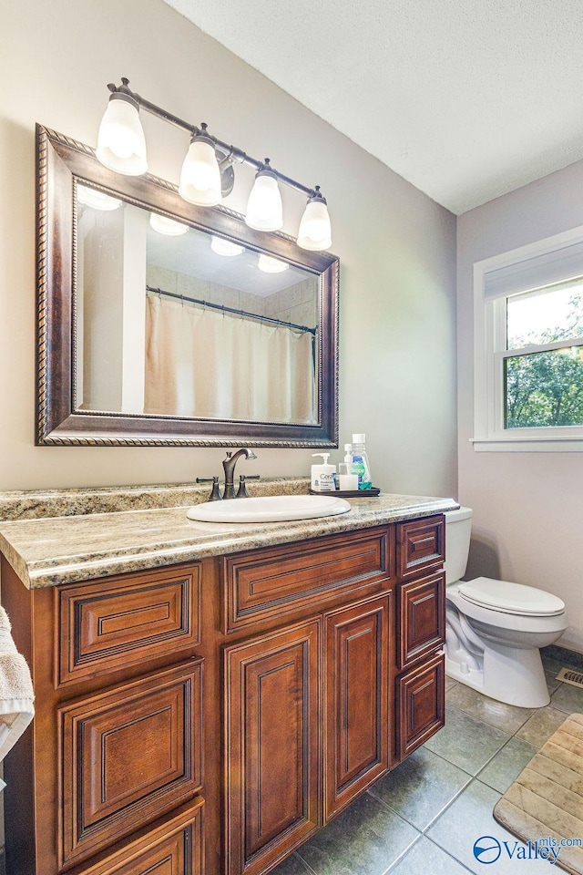 3392 Williams St, Hokes Bluff, AL 35903 - full bathroom featuring vanity and tile patterned flooring