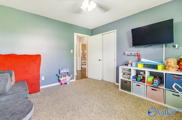 3392 Williams St, Hokes Bluff, AL 35903 - rec room with a ceiling fan and carpet floors