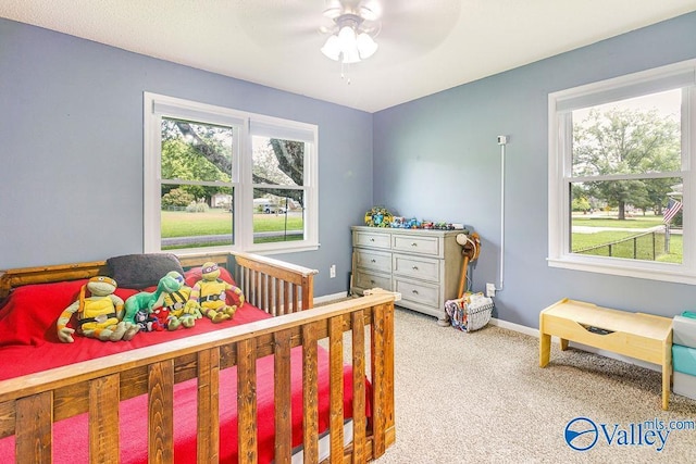 3392 Williams St, Hokes Bluff, AL 35903 - carpeted bedroom featuring ceiling fan and baseboards