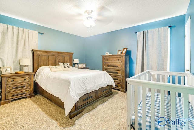 3392 Williams St, Hokes Bluff, AL 35903 - carpeted bedroom featuring ceiling fan and a textured ceiling