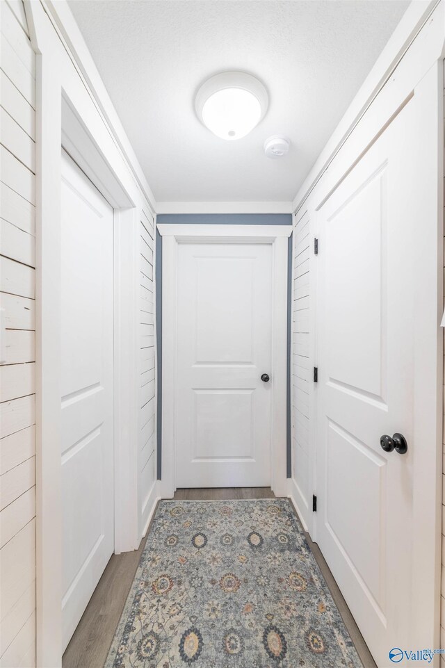 corridor featuring light wood-type flooring