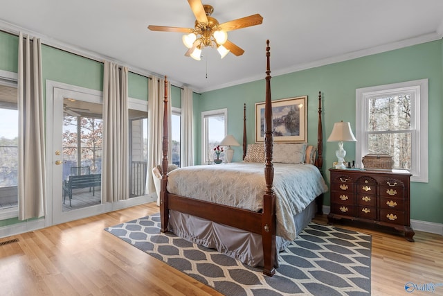 bedroom with crown molding, ceiling fan, access to exterior, and light wood-type flooring