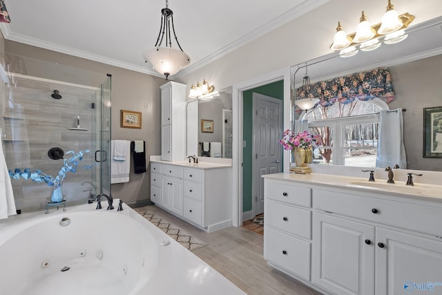 bathroom with crown molding, vanity, independent shower and bath, and wood-type flooring