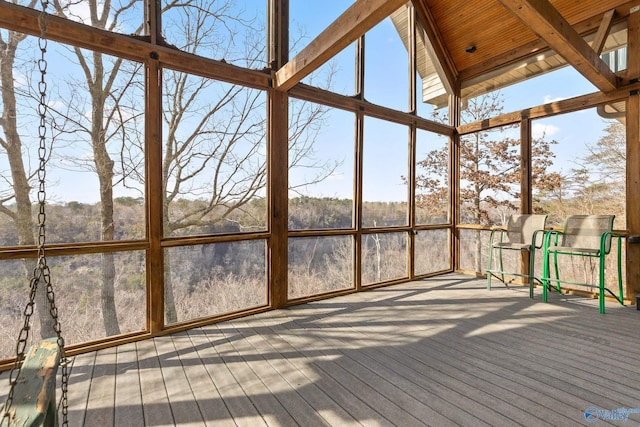 unfurnished sunroom with plenty of natural light