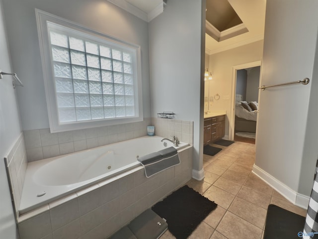 ensuite bathroom featuring vanity, connected bathroom, crown molding, and tile patterned flooring
