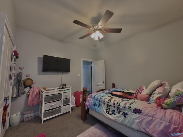 bedroom featuring ceiling fan and carpet