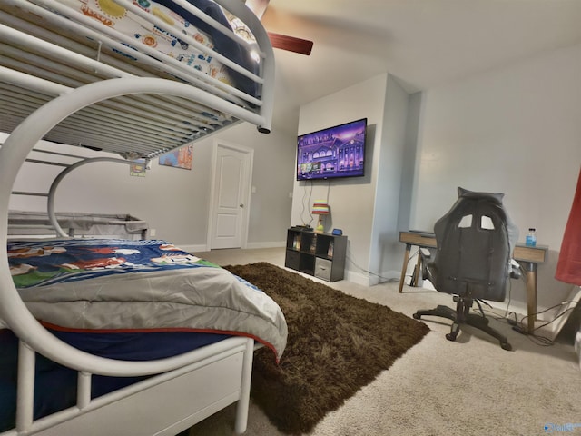 bedroom featuring a ceiling fan, carpet floors, and baseboards