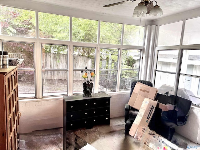 102 Jackson St, Albertville, AL 35950 - sunroom / solarium featuring healthy amount of natural light, a ceiling fan, and concrete flooring