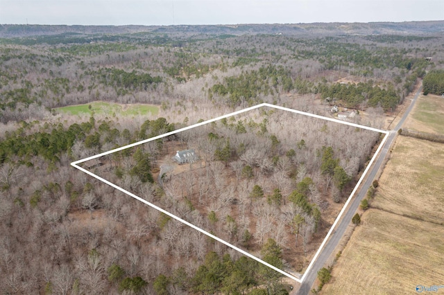 aerial view with a rural view and a view of trees