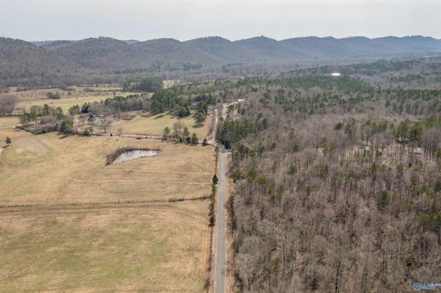 drone / aerial view with a rural view and a mountain view