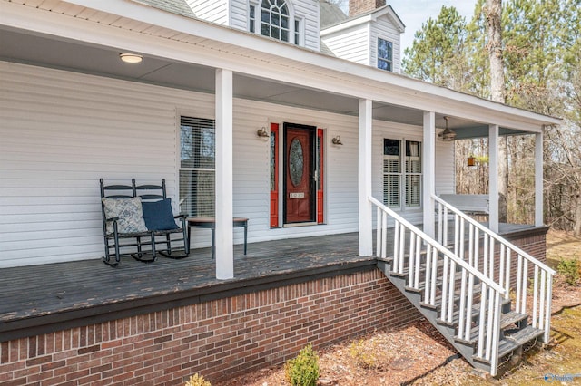 doorway to property with a porch