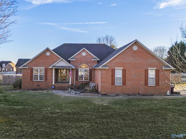 single story home featuring a front yard