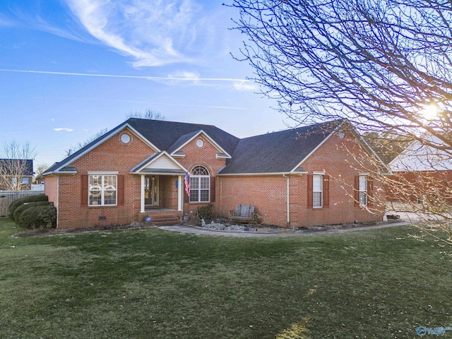 ranch-style home with a front yard