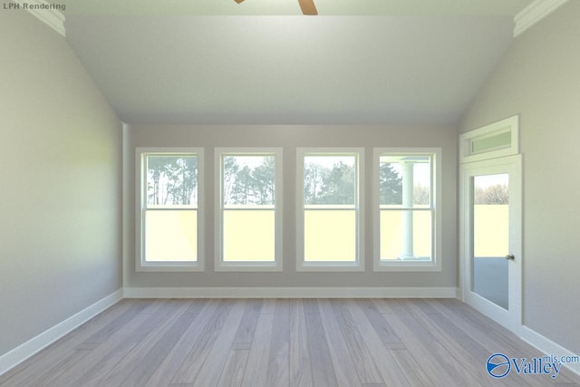 unfurnished sunroom featuring ceiling fan and vaulted ceiling