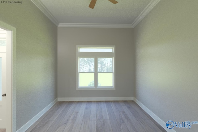 spare room featuring a textured ceiling, light wood-type flooring, ceiling fan, and crown molding