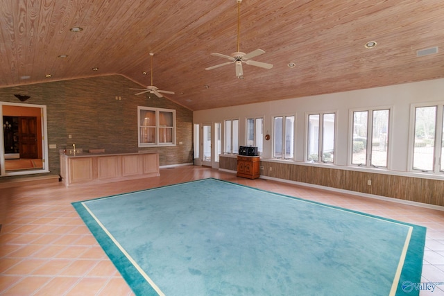 interior space with lofted ceiling and wooden ceiling