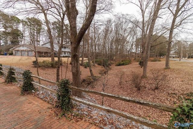 view of yard featuring a garage