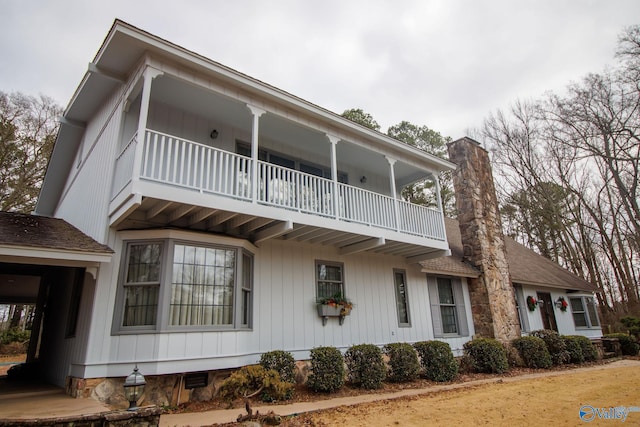 exterior space with a balcony