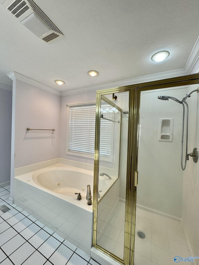 bathroom featuring tile patterned flooring, crown molding, a textured ceiling, and separate shower and tub