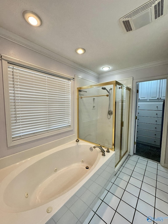 bathroom featuring tile patterned flooring, crown molding, and separate shower and tub