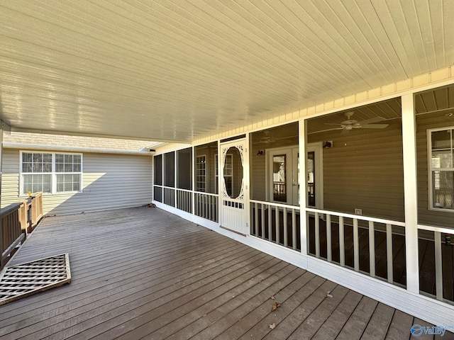 wooden terrace featuring ceiling fan