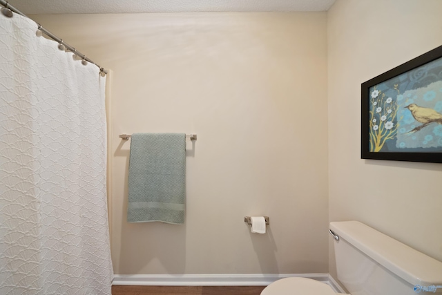 2010 Burlington Dr SE, Huntsville, AL 35803 - full bathroom featuring wood finished floors and a shower with curtain