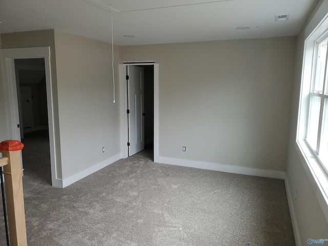 empty room with carpet floors