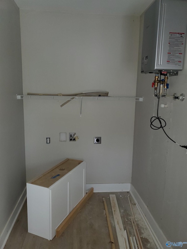 laundry area featuring ceiling fan, tankless water heater, washer hookup, and hookup for an electric dryer