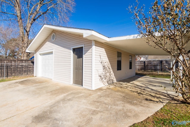 exterior space with a carport