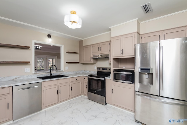 kitchen featuring sink, ornamental molding, and appliances with stainless steel finishes