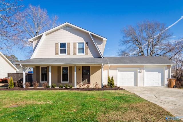 view of front of house with a porch, a garage, and a front lawn