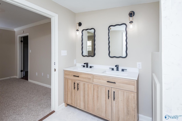 bathroom with crown molding and vanity