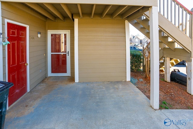 doorway to property with a patio area